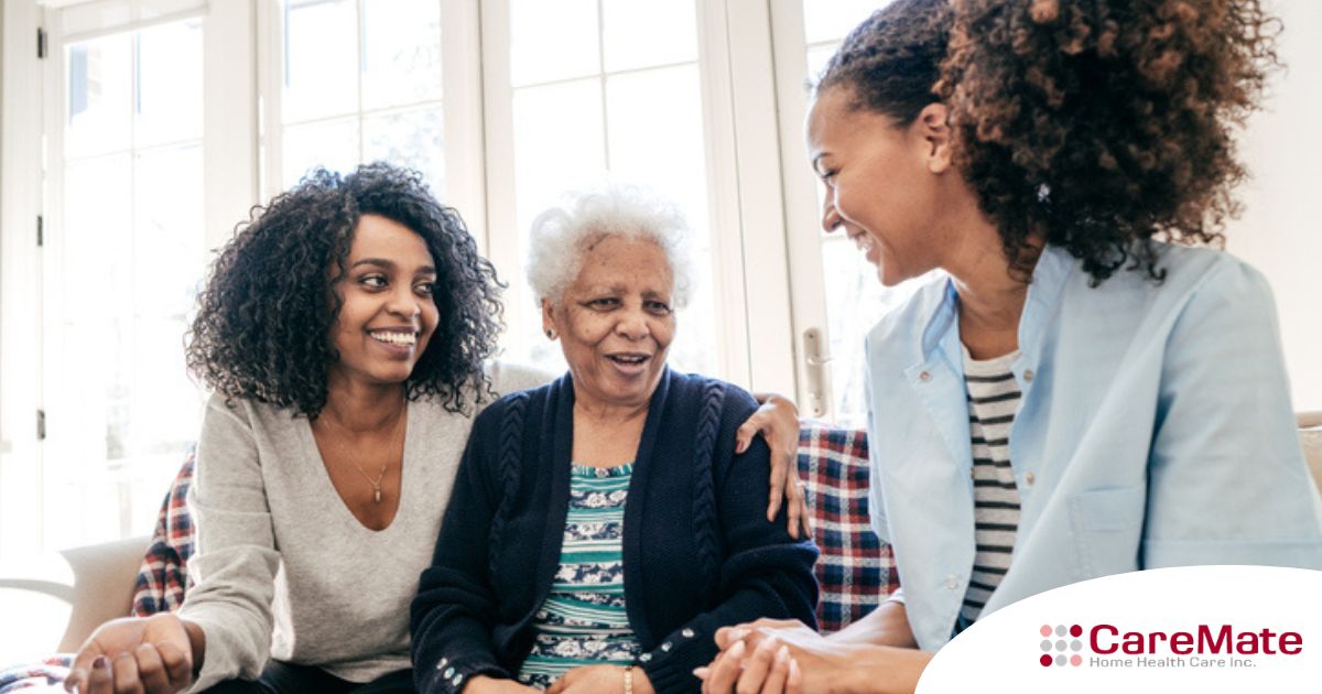 Caregiver talking to a family about Elderly Care