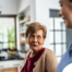 Caregiver provides attentive senior care as part of diabetes awareness